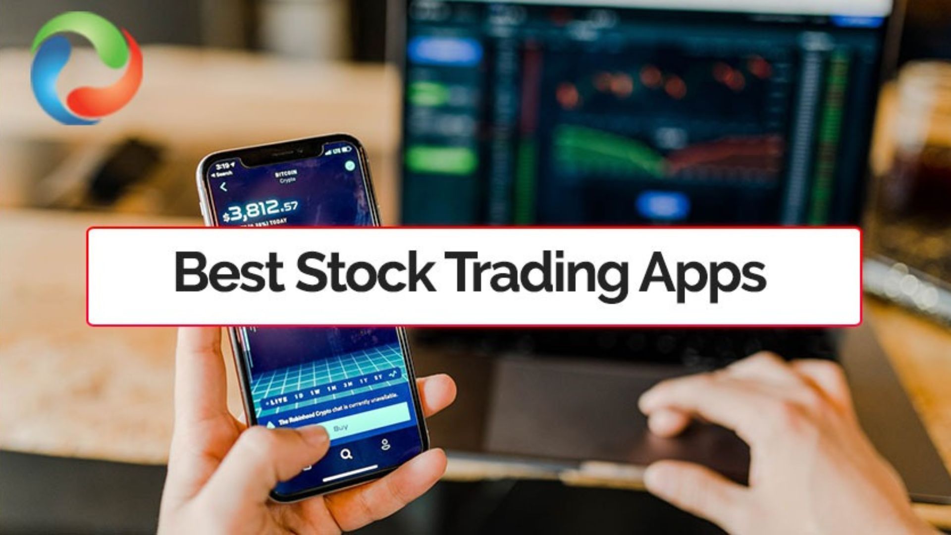 A Man Holding a Phone Using One of the Top 10 Best Stock Trading Apps in 2024